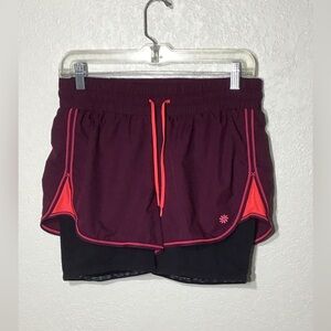 Athleta Women's Racer Run2 in 1 Running shorts Compression liner Zip Pocket Sz S